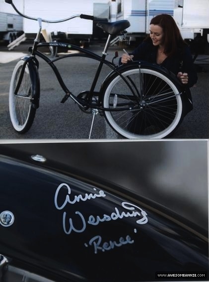 Annie Wersching signing bicycle