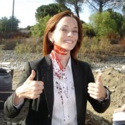 Annie Wersching with bloody neck 24 Season 7 behind the scenes