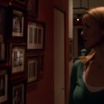 Annie Wersching Killer Instinct looking at family photos