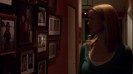 Annie Wersching Killer Instinct looking at family photos