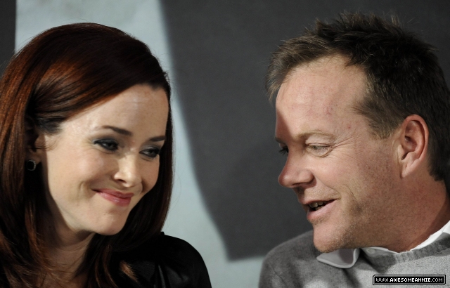 Annie Wersching and Kiefer Sutherland laughing in Munich