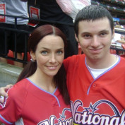 Annie Wersching poses with fan at celebrity softball game