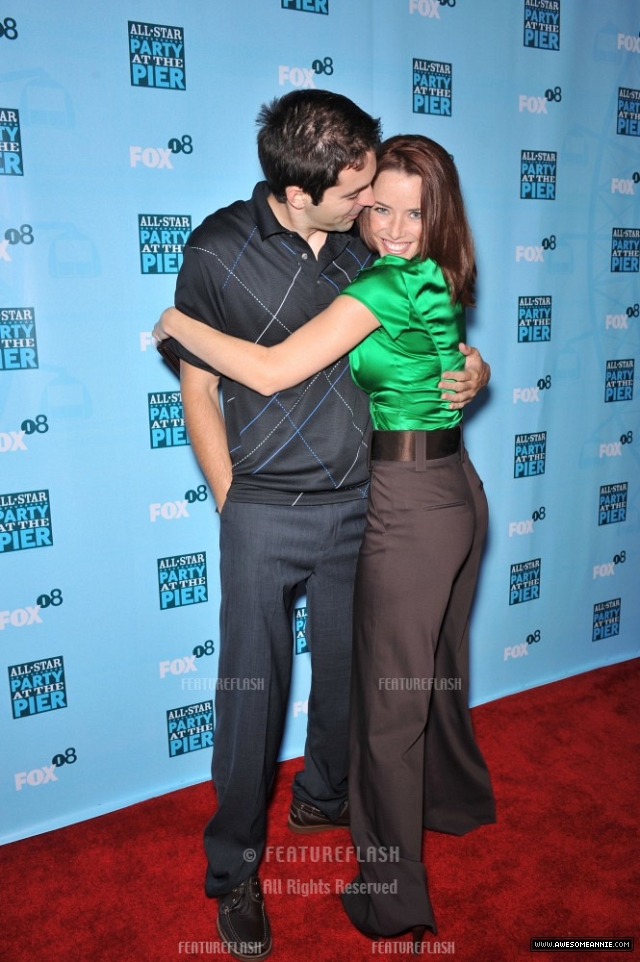 Annie Wersching and Rhys Coiro hug at FOX All-Star Party