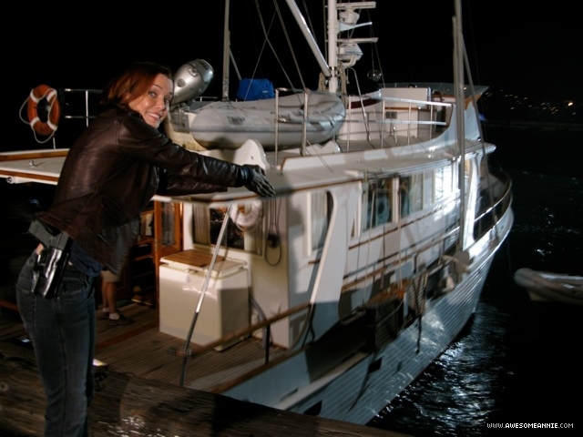 Annie Wersching near boat at night