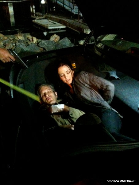 Annie Wersching and Jon Sklaroff in trunk of a car