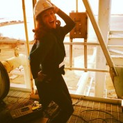 Annie Wersching with hard hat - Behind the Scenes of Dallas